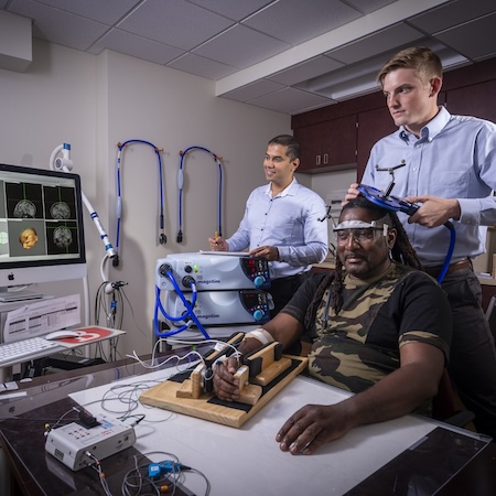 Provider performing research with patient